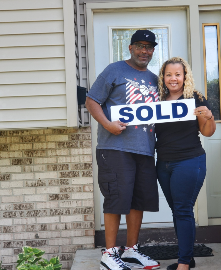 Sold Sign Couple